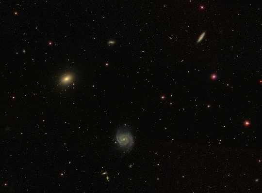 An image of galaxies NGC 1042, NGC 1052, NGC 1035 in Cetus provided by the Sloan Digital Sky Survey (SDSS)