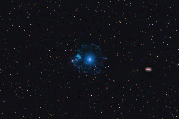 An image of NGC 6543 and NGC 6552 in Draco provided by Kent Biggs
